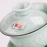 Porcelain Celadon Golden Fish Tea Cup